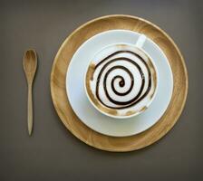 Cup of mocha coffee on wood table photo