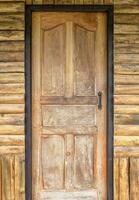 Wood door on the teak house photo