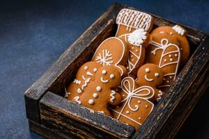 Beautiful festive Christmas composition of tangerines, gingerbread and star anise photo