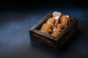 Beautiful festive Christmas composition of tangerines, gingerbread and star anise photo