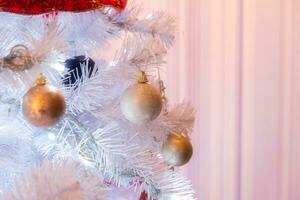 White Christmas tree illumination with ball glitter decoration photo