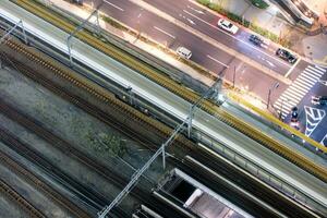 Aerial view of high-speed train motion blur rapid with traffic photo