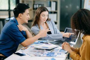 UX developer and ui designer brainstorming about mobile app interface wireframe design with customer breif and color code photo
