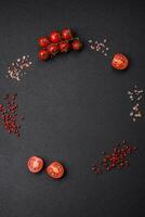 Ingredients for cooking cherry tomatoes, salt, spices and herbs photo