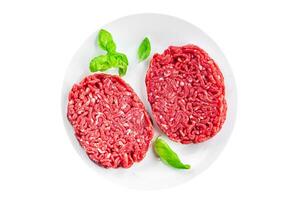 ground meat raw cutlet fresh beef meat hamburger eating cooking appetizer meal food snack on the table copy space food background rustic top view photo