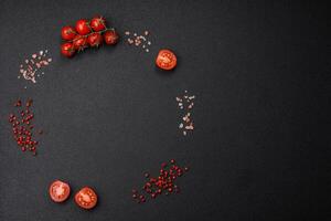 Ingredients for cooking cherry tomatoes, salt, spices and herbs photo