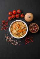 Delicious Uzbek pilaf with chicken, carrots, barberry, spices and herbs photo