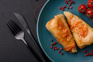 Delicious cabbage rolls with meat, rice, salt, spices and herbs photo