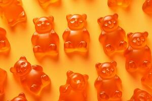 AI Generative. Orange flavored immune gummy bears for children are lined up on an orange background. View from above. Dietary supplement photo
