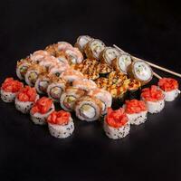 Sushi set on slate plate photo