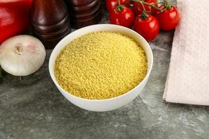 Raw dry wheat couscous grain photo