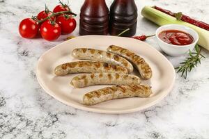 Grilled natural organick white sausages photo