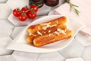 Fried cheese sticks for snack photo