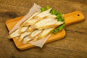 Eel sashimi over wooden background photo