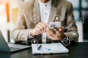 Businessman working with smart phone and laptop and digital tablet computer in office with digital marketing media in virtual icon photo