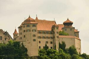 a castle on top of a hill photo