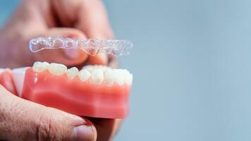 Invisible and removable aligners for teeth alignment photo