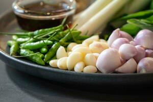 Herb ingredients for Thai Food cooking menu on the counter kitchen ready to process. photo