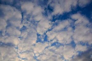 a blue sky with clouds photo