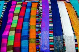 colorful scarves for sale at the market photo