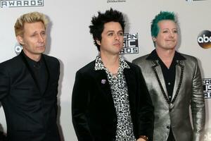 LOS ANGELES - NOV 20  Mike Dirnt, Billie Joe Armstrong, Tr Cool, Green Day at the 2016 American Music Awards at Microsoft Theater on November 20, 2016 in Los Angeles, CA photo