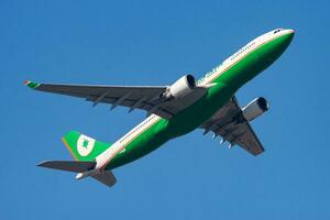 EVA Air Airbus A330-200 B-16307 passenger plane departure and take off at Hong Kong Chek Lap Kok Airport photo