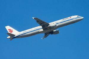 Air China Airbus A321 B-9919 passenger plane departure and take off at Hong Kong Chek Lap Kok Airport photo