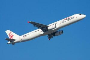 Dragonair Airbus A321 B-HTI passenger plane departure and take off at Hong Kong Chek Lap Kok Airport photo