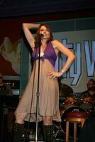 Lucy Lawless performs at Universal CityWalks Summer Block Party in Universal City CA on June 28 2008 photo