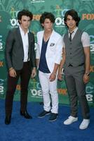Jonas Brothers arriving at the Teen Choice Awards 2008 at the Universal Ampitheater at Universal Studios in Los Angeles CA August 3 2008 photo