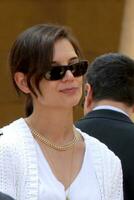 Katie Holmes at the Cameron Diaz Star on the Hollywood Walk of Fame Ceremony in front of the Egyptian Theater on June 22 2009 photo