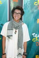 Justin Chon arriving at the Teen Choice Awards 2009 at Gibson Ampitheater at Universal Studios Los Angeles CA on August 9 2009 photo