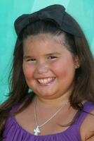 Madison de la Garza arriving at the Teen Choice Awards 2009 at Gibson Ampitheater at Universal Studios Los Angeles CA on August 9 2009 photo