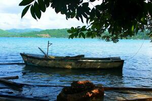 Fishing Boat Floating in Sea Harbor photo