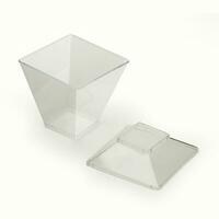 Plastic square cup or glass isolated over white background photo