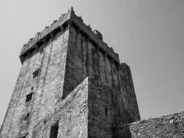 Ancient tower background, Blarney castle in Ireland, celtic fortress photo