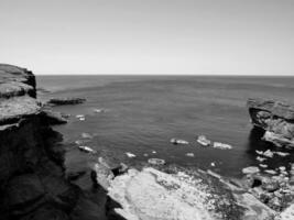 Cliffs and Atlantic ocean, rocks canyon and laguna, beauty in nature. Vacation travel background photo