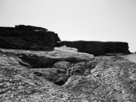 Cliffs and Atlantic ocean, clouds, rocks and laguna, beauty in nature. Vacation trip relaxation background photo