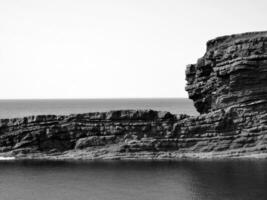 Cliffs and the Atlantic ocean background, rocks and laguna, beauty in nature. Vacation trip wallpaper photo