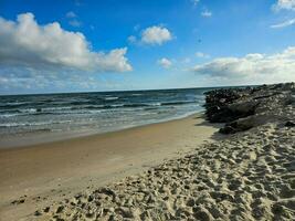 impresiones de el interminable playa a el del Norte mar en blavand Dinamarca foto