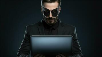 portrait hacker wearing suit holding the laptop on grey isolated background with ai generated photo