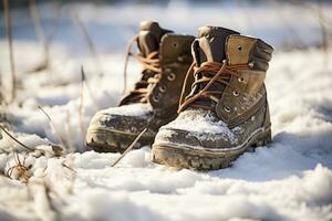 desgastado botas en Fresco nieve debajo luz de sol. generativo ai foto