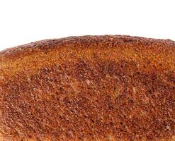 Black bread in the form of a brick closeup photo