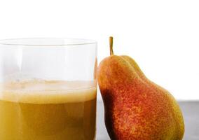Pear Juice with fresh fruits close up photo