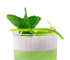 Summer foam cocktail decorated with mint photo