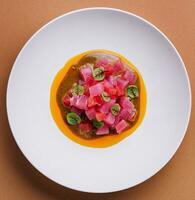 tuna tartare with micro beetroot leaves photo