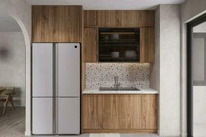 Wooden cupboard and cabinet with marble kitchen counter and fridge set up in the wall. photo