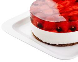 Fresh strawberry with currant jelly cake on plate photo