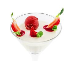 Italian dessert panna cotta with red fresh strawberries photo