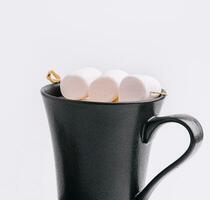 Hot chocolate with marshmallows in mug photo